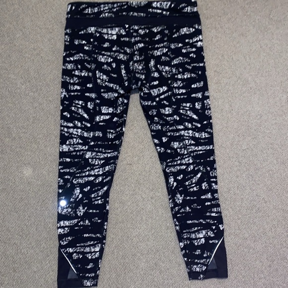 Lululemon Inspire Tight black/white with front zippered pockets and mesh sz 10 - Picture 8 of 11